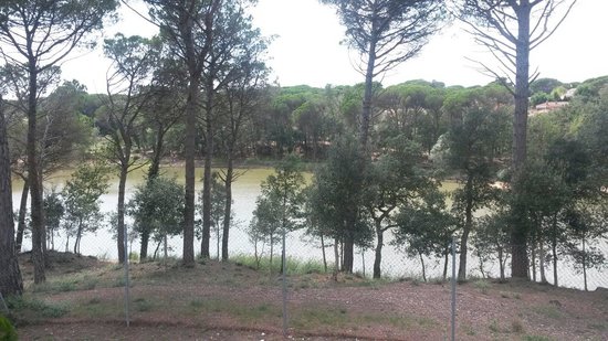 Pintar casa en el llac del signe Caldes de Malavella